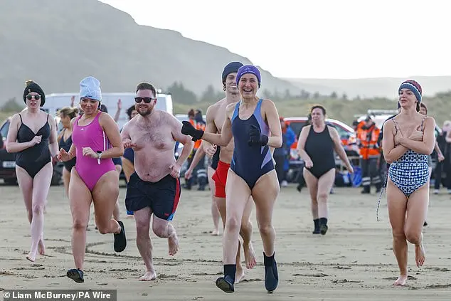 Community Celebrates New Year's Day with Icy Dip in North Tyneside Despite Cold Conditions