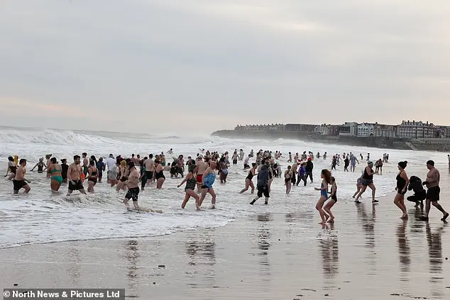 Community Celebrates New Year's Day with Icy Dip in North Tyneside Despite Cold Conditions