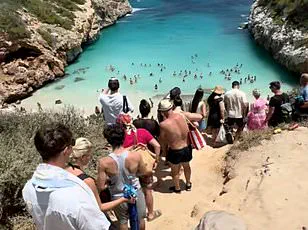 Viral Fame Turns Hidden Gem into Overrun Beach: Mallorca Owners Plan Fencing Amid Tourism Chaos