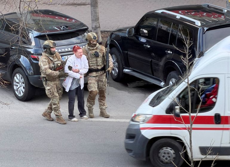 Kyiv Gunman Killed; Hostages Rescued.